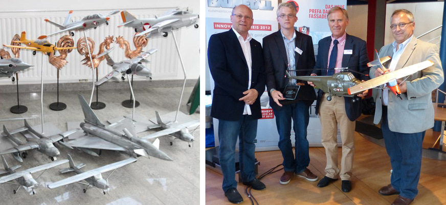 Innovationspreis 2012: Die österreichischen Kollegen Ottmar Berner (li.) und Ernst Zimmermann (r.) feiern den Erfolg von&nbsp;&nbsp;Thomas und Friedrich Reinbold beim BUAMETALL-Innovationspreis 2012. Links sind einige Flugzeugmodelle abgebildet