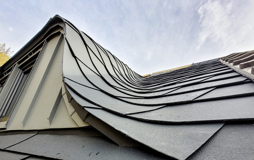 &nbsp;Formschön: Die kleinformatigen Aluminiumelemente schmiegen sich perfekt an die Rundungen an