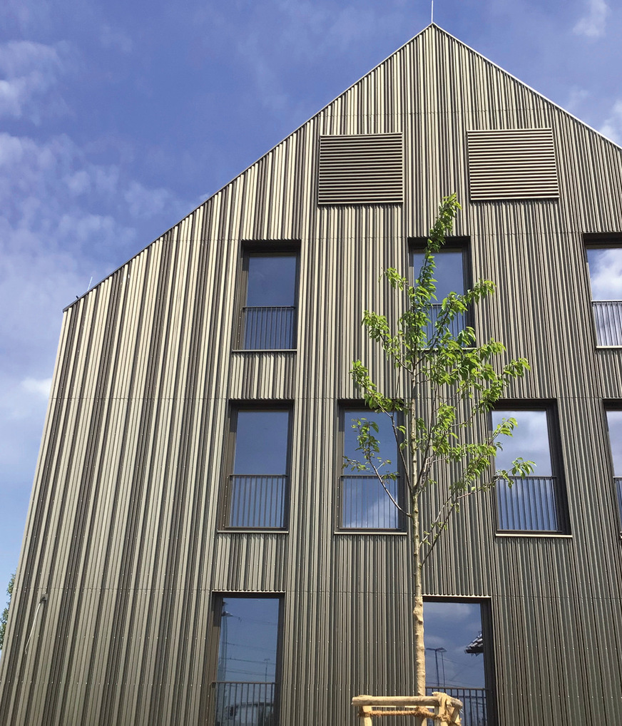 Eine Fassade, so edel wie ein maß­geschneiderter Nadelstreifenanzug