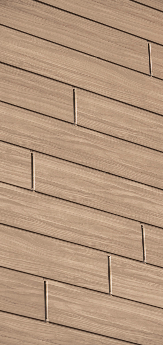 Täuschend echt: die Aluminium­-Sidings mit Holzoptik-Oberfläche