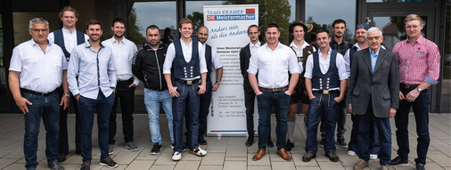 Bernd Kramer (l.) mit Meistern und Dozenten