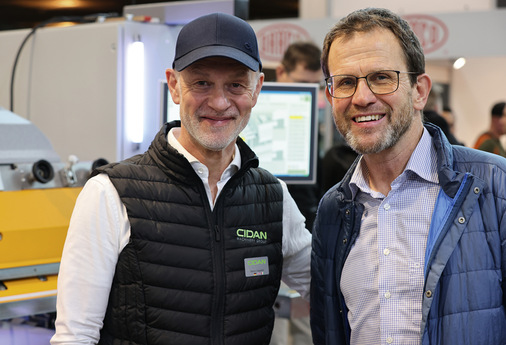 Marco Cappello und Götz Fiessler am Cidan-Messestand - © Bild: BAUMETALL
