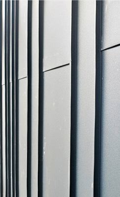 Vielfältige Fassadenstrukturen als Kassette und als Falzfassade