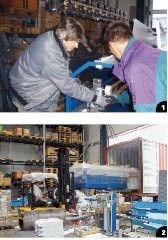 1 René Engelhardt und Daniel Wohl­gemut beim Austauschen der Wechselkassetten an der neuen Quadro 2 Abfahrtbereit: Der Container mit der neuen Quadro wird in wenigen Wochen bei ZC-Technical eintreffen