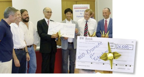 <p>A. Buck, G. Brenner, B. Zürn, A. Mizutani, S. Iwamoto, J. Schmalzl und U. Leib bei der ­Übergabe des 1000. Kranichs</p> - © Buck