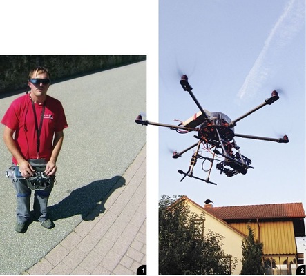 <p>1 Mit Videobrille ausgestattet startet Frank Preuss...<br />
2 ... den ferngesteuerten Multicopter, um Fotos vom Metalldach zu machen</p> - © Frank Preuss für BAUMETALL