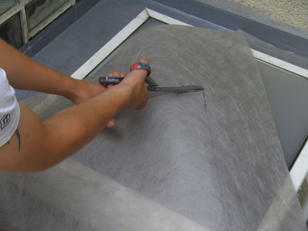 Auflegen des Schutzflies - Enke-Werk