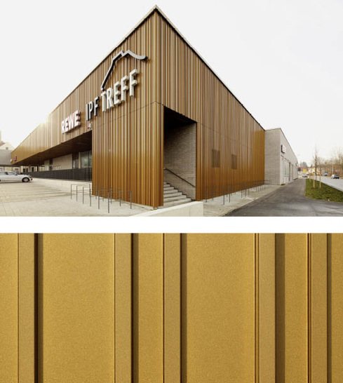 Projekt mit Duraflon-Lackierung: die goldfarbene Metallfassade mit mattem Glanz am Einkaufszentrum IPF Treff in Bopfingen. Der Spezialist für Oberflächenveredelungen HD Wahl beschichtete die Fassadenelemente