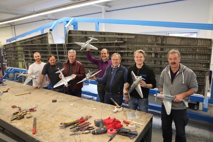 Zufriedene Workshop-Teilnehmer und Trainer