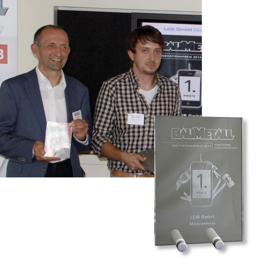 <p>Ulrich und Michael Leib freuen sich über den 1. Preis</p> - © BAUMETALL